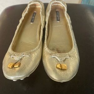 Size 9 used Louis Vuitton gold shoes